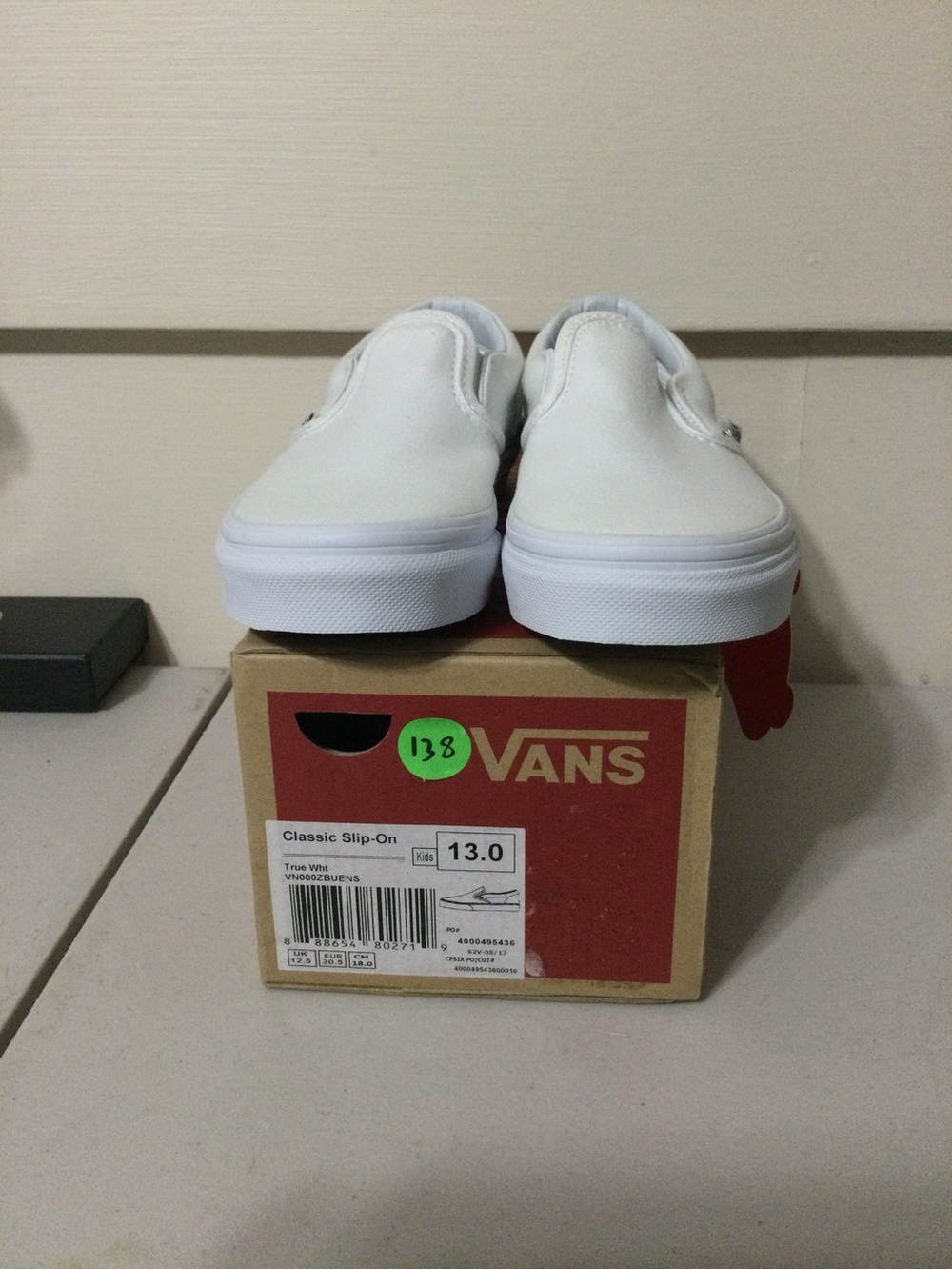 Vans White Slip-On Canvas Sneakers